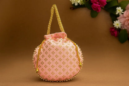 Handcrafted Silk-Blend Potli Bag with Golden Zari Motifs & Pearl Handle